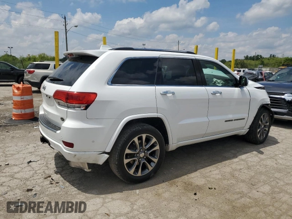 2017 Jeep Grand Cherokee Overland with VIN 1C4RJFCGXHC823593, listed as a Copart auction lot 58727205 with Not provided miles and Salvage title. Bid and sale history available at DreamBid. Image 3.