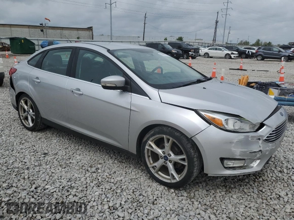 2016 Ford Focus Titanium with VIN 1FADP3J22GL354941, listed as a Copart auction lot 54401135 with 144,142 mi miles and Salvage title. Bid and sale history available at DreamBid. Image 4.
