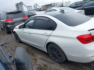 2018 BMW 3 Series 320i xDrive with VIN WBA8E5G52JNU46803, listed as a IAAI auction lot 41869625 with 67,057 mi miles. Bid and sale history available at carsss.com. Image 15.