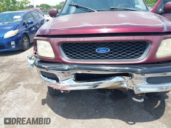 1998 Ford F-150 XL with VIN 2FTRX08L8WCA36361, listed as a IAAI auction lot 42617079 with 263,666 mi miles and . Bid and sale history available at DreamBid. Image 6.