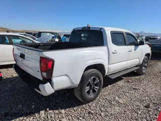 2019 Toyota Tacoma 4WD SR with VIN 3TMCZ5ANXKM230803, listed as a Copart auction lot 50648215 with 88,179 mi miles and Salvage Title. Bid and sale history available at carsss.com. Image 3.
