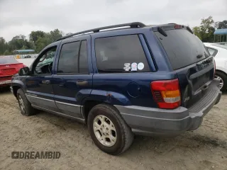 2002 Jeep Grand Cherokee z VIN 1J4GX38S42C229150, wystawiony jako Copart lot #72586834 z przebiegiem 201 103 mil mil oraz Szkoda całkowita • Salvage title. Historia ofert i sprzedaży dostępna na DreamBid. Obrazek 2.