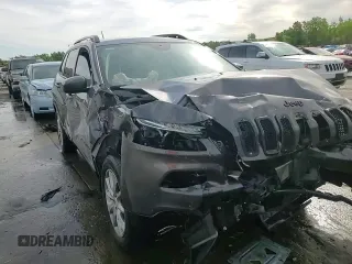 2018 Jeep Cherokee Latitude z VIN 1C4PJMCX3JD586604, wystawiony jako Copart lot #59128315 z przebiegiem 100 892 mil mil oraz Szkoda całkowita • Salvage title. Historia ofert i sprzedaży dostępna na DreamBid. Obrazek 14.