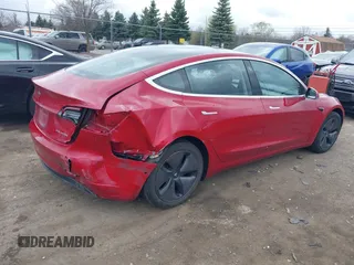 2018 Tesla Model 3 Long Range Battery with VIN 5YJ3E1EB3JF129772, listed as a IAAI auction lot 42017305 with 103,825 mi miles and . Bid and sale history available at DreamBid. Image 4.