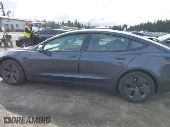 2023 Tesla Model 3 with VIN 5YJ3E1EA2PF623217, listed as a IAAI auction lot 41701413 with 21,246 mi miles and . Bid and sale history available at DreamBid. Image 15.