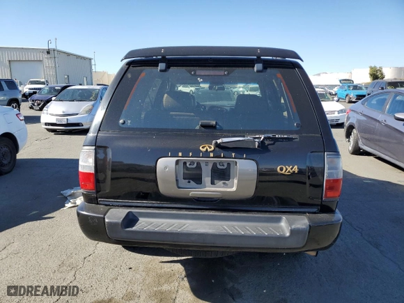 1999 Infiniti QX4 with VIN JNRAR05Y0XW050770, listed as a Copart auction lot 79668764 with 194699 miles and Clean Title. Bid and sale history available at carsss.com. Image 6.