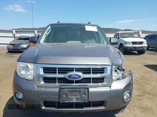 2011 Ford Escape XLT with VIN 1FMCU9DG4BKA07985, listed as a IAAI auction lot 42510948 with 125,126 mi miles and . Bid and sale history available at DreamBid. Image 12.