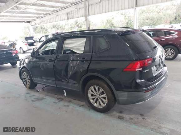2019 Volkswagen Tiguan S with VIN 3VV1B7AX1KM073074, listed as a IAAI auction lot 41387775 with 57,045 mi miles. Bid and sale history available at carsss.com. Image 14.