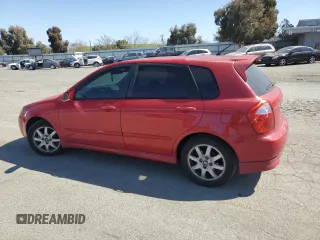 2005 Kia Spectra with VIN KNAFE162455069422, listed as a Copart auction lot 52999455 with 249,774 mi miles and Salvage Title. Bid and sale history available at carsss.com. Image 2.