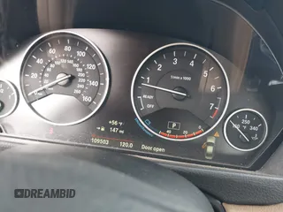 2015 BMW 3 Series 328i with VIN WBA3A5C59FF606446, listed as a IAAI auction lot 41059621 with 109,503 mi miles. Bid and sale history available at carsss.com. Image 7.