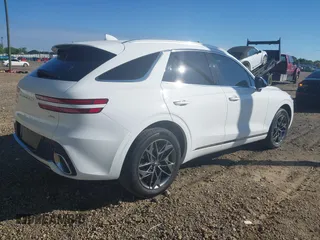 2023 Genesis GV70 2.5T with VIN KMUMADTB7PU120364, listed as a IAAI auction lot 42186139 with 24,686 mi miles and . Bid and sale history available at DreamBid. Image 4.
