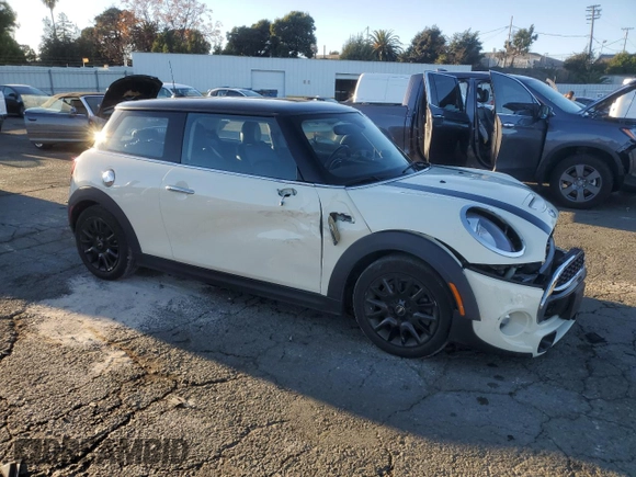 2018 MINI Hardtop Cooper S with VIN WMWXP7C59J2A47236, listed as a Copart auction lot 82917104 with 69,195 mi miles and Salvage Title. Bid and sale history available at DreamBid. Image 4.