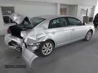 2009 Toyota Avalon XL with VIN 4T1BK36B69U341854, listed as a IAAI auction lot 41727553 with 102,369 mi miles. Bid and sale history available at carsss.com. Image 4.