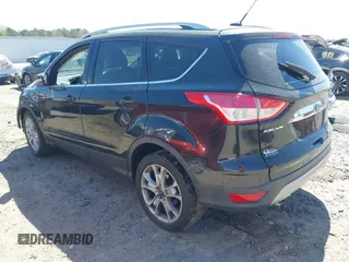 2015 Ford Escape Titanium with VIN 1FMCU0J91FUB36973, listed as a IAAI auction lot 41889560 with 93,445 mi miles and . Bid and sale history available at DreamBid. Image 3.