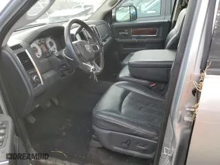 2009 Dodge Ram 1500 Laramie with VIN 1D3HV13T39J530042, listed as a Copart auction lot 41770485 with 128,856 mi miles and Clean Title. Bid and sale history available at carsss.com. Image 7.