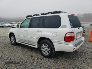 2004 Lexus LX 470 with VIN JTJHT00W343547828, listed as a Copart auction lot 48982045 with 196,877 mi miles and Salvage Title. Bid and sale history available at DreamBid. Image 2.