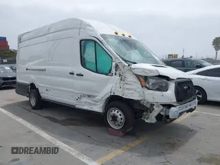 2022 Ford Transit Cargo z VIN 1FTBF4XG3NKA44975, wystawiony jako IAAI lot #42161004 z przebiegiem 40 682 mil mil oraz . Historia ofert i sprzedaży dostępna na DreamBid. Obrazek 1.