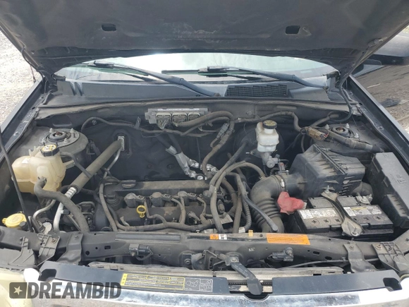 2010 Ford Escape Limited with VIN 1FMCU0E73AKD37125, listed as a Copart auction lot 59763495 with 203,823 mi miles and Salvage title. Bid and sale history available at DreamBid. Image 12.
