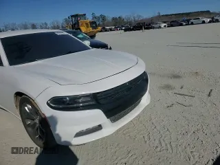 2015 Dodge Charger SXT with VIN 2C3CDXHG9FH915076, listed as a Copart auction lot 46792735 with 156,199 mi miles and Salvage Title. Bid and sale history available at DreamBid. Image 11.