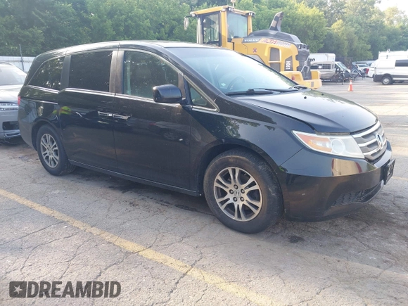 2012 Honda Odyssey EX-L with VIN 5FNRL5H60CB075811, listed as a IAAI auction lot 42518159 with 243,186 mi miles and . Bid and sale history available at DreamBid. Image 1.