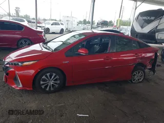 2021 Toyota Prius LE with VIN JTDKAMFP6M3189145, listed as a IAAI auction lot 42021116 with 80,722 mi miles and . Bid and sale history available at DreamBid. Image 14.