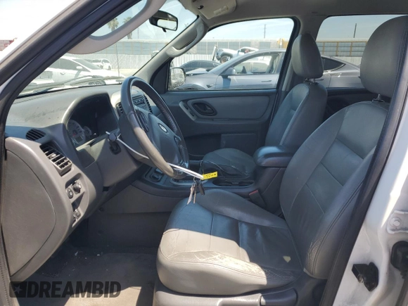 2007 Ford Escape Hybrid with VIN 1FMCU49H87KB61613, listed as a Copart auction lot 58083235 with 129,049 mi miles and Salvage title. Bid and sale history available at DreamBid. Image 7.