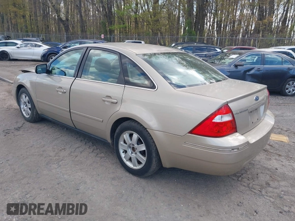 2005 Ford Five Hundred SE z VIN 1FAFP23115G121341, wystawiony jako IAAI lot #42027397 z przebiegiem 110 851 mil mil oraz . Historia ofert i sprzedaży dostępna na DreamBid. Obrazek 3.