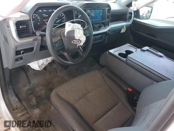 2023 Ford F-150 XL with VIN 1FTMF1C5XPKE35376, listed as a Copart auction lot 57109915 with 25,832 mi miles and Salvage title. Bid and sale history available at DreamBid. Image 8.