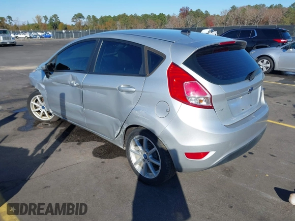 2019 Ford Fiesta SE with VIN 3FADP4EJ0KM107058, listed as a IAAI auction lot 40979683 with 116,854 mi miles. Bid and sale history available at carsss.com. Image 3.