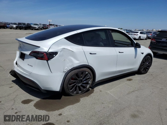 2022 Tesla Model Y Performance z VIN 7SAYGDEF6NF397082, wystawiony jako Copart lot #55823435 z przebiegiem Nie podano mil oraz Szkoda całkowita • Salvage title. Historia ofert i sprzedaży dostępna na DreamBid. Obrazek 3.