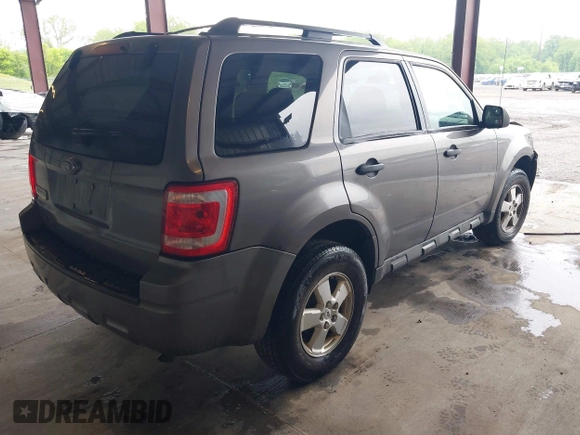 2009 Ford Escape XLS with VIN 1FMCU02759KC84959, listed as a IAAI auction lot 42219257 with 263,087 mi miles and . Bid and sale history available at DreamBid. Image 4.