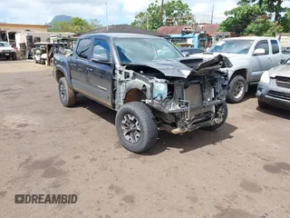2023 Toyota Tacoma SR with VIN 3TYCZ5ANXPT143026, listed as a IAAI auction lot 42588447 with 11,667 mi miles and . Bid and sale history available at DreamBid. Image 1.