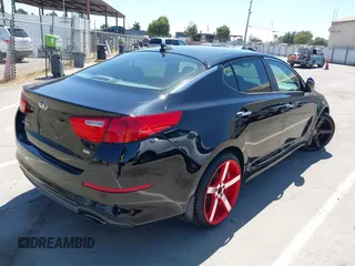 2015 Kia Optima LX z VIN 5XXGM4A76FG507580, wystawiony jako IAAI lot #42544939 z przebiegiem 99 804 mil mil oraz . Historia ofert i sprzedaży dostępna na DreamBid. Obrazek 4.