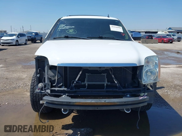 2011 GMC Yukon SLT z VIN 1GKS1CE00BR210794, wystawiony jako IAAI lot #41958998 z przebiegiem 225 407 mil mil oraz . Historia ofert i sprzedaży dostępna na DreamBid. Obrazek 13.