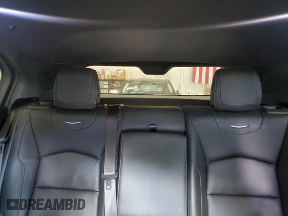 2022 Cadillac XT4 FWD Luxury z VIN 1GYAZAR45NF124737, wystawiony jako Copart lot #53164135 z przebiegiem 41 344 mil mil oraz Szkoda całkowita • Salvage title. Historia ofert i sprzedaży dostępna na DreamBid. Obrazek 10.