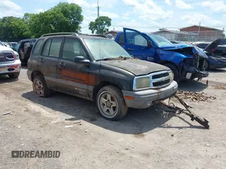 2003 Chevrolet Tracker z VIN 2CNBJ134X36921126, wystawiony jako IAAI lot #42536787 z przebiegiem 199 063 mil mil oraz . Historia ofert i sprzedaży dostępna na DreamBid. Obrazek 1.