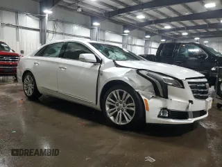 2018 Cadillac XTS Luxury with VIN 2G61N5S35J9122938, listed as a Copart auction lot 48697025 with 94,806 mi miles and Salvage title. Bid and sale history available at DreamBid. Image 4.