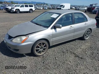 2005 Mitsubishi Lancer ES with VIN JA3AJ26E55U014748, listed as a IAAI auction lot 41935566 with 255,336 mi miles. Bid and sale history available at carsss.com. Image 2.