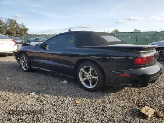 1999 Pontiac Firebird Trans Am with VIN 2G2FV32G1X2217352, listed as a Copart auction lot 79941714 with 174,580 mi miles and Salvage title. Bid and sale history available at DreamBid. Image 2.