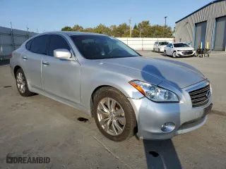 2012 Infiniti M37 with VIN JN1BY1AP9CM336121, listed as a Copart auction lot 71656374 with 125,497 mi miles and Salvage Title. Bid and sale history available at carsss.com. Image 4.