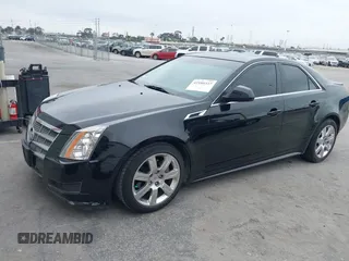 2011 Cadillac CTS Luxury with VIN 1G6DF5EYXB0103430, listed as a IAAI auction lot 42105337 with 205,069 mi miles and . Bid and sale history available at DreamBid. Image 17.