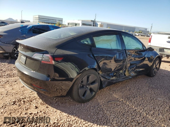 2021 Tesla Model 3 Standard Range Plus with VIN 5YJ3E1EA3MF996701, listed as a Copart auction lot 47013195 with 34,177 mi miles and Salvage Title. Bid and sale history available at carsss.com. Image 3.