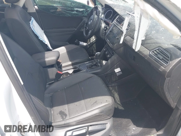 2018 Volkswagen Tiguan SEL with VIN 3VV3B7AX4JM201878, listed as a IAAI auction lot 42083809 with 115,956 mi miles and . Bid and sale history available at DreamBid. Image 5.