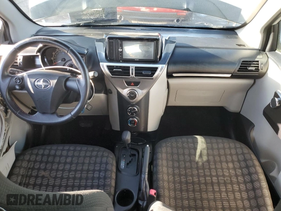2014 Scion iQ with VIN JTNJJXB01EJ026837, listed as a Copart auction lot 43596385 with 52,826 mi miles and Salvage title. Bid and sale history available at DreamBid. Image 8.