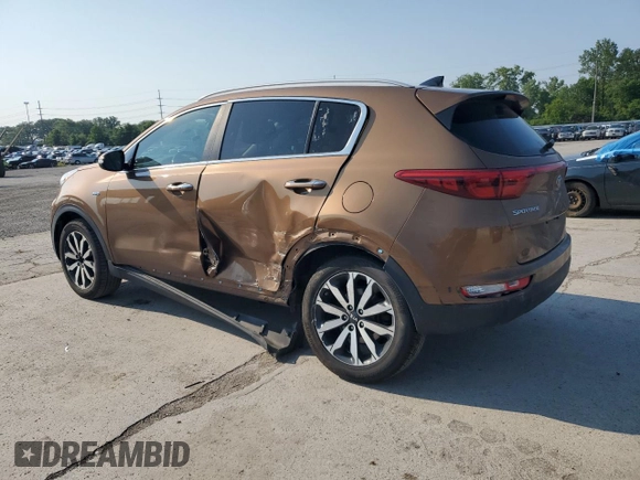 2017 Kia Sportage EX with VIN KNDPNCAC9H7054281, listed as a Copart auction lot 60571945 with 106,516 mi miles and Salvage title. Bid and sale history available at DreamBid. Image 2.
