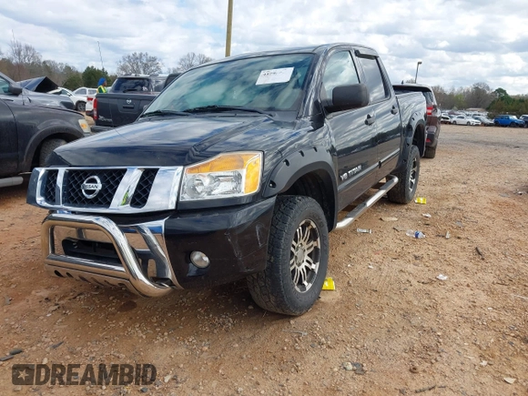 2012 Nissan Titan S with VIN 1N6AA0EC1CN322929, listed as a IAAI auction lot 41792414 with 124,182 mi miles. Bid and sale history available at carsss.com. Image 2.