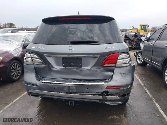 2017 Mercedes-Benz GLE with VIN 4JGDA5HB9HA992609, listed as a IAAI auction lot 41724638 with 205,921 mi miles. Bid and sale history available at carsss.com. Image 16.