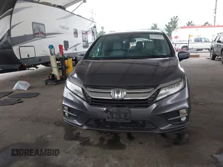 2019 Honda Odyssey Touring z VIN 5FNRL6H88KB037149, wystawiony jako IAAI lot #42356871 z przebiegiem 64 549 mil mil oraz . Historia ofert i sprzedaży dostępna na DreamBid. Obrazek 12.