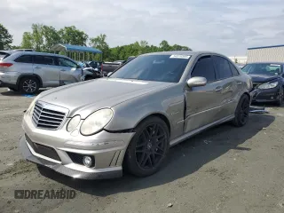 2005 Mercedes-Benz E-Class 5.5L AMG with VIN WDBUF76J15A768563, listed as a Copart auction lot 54874585 with 108,952 mi miles and Salvage Title. Bid and sale history available at carsss.com. Image 1.