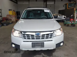 2012 Subaru Forester 2.5X with VIN JF2SHABC0CH461107, listed as a IAAI auction lot 42000513 with 70,598 mi miles. Bid and sale history available at carsss.com. Image 12.